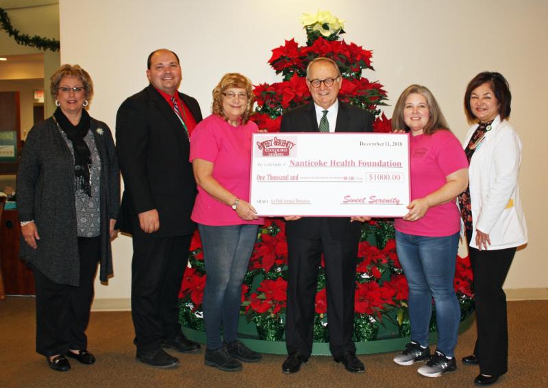 Brandy Widdowson and Elinor Barry, new owners of Sweet Serenity Chocolates and Desserts in Seaford, presents Nanticoke Health Foundation with a check for $1000 in support of cancer services at Nanticoke. Also pictured is Renee’ Morris, Foundation Executive Director, Ray Fulkrod, VP, Clinical Operations, Steve Rose, NHS President/CEO and Rachel Gardner, RN,BSN, Director of the Allen Cancer Center.